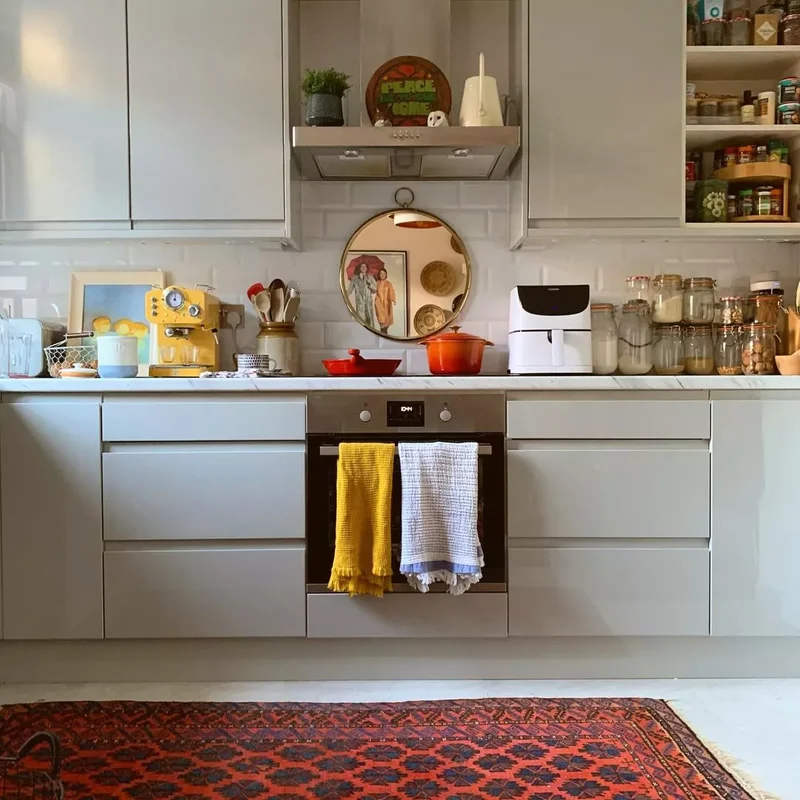 43 Stunning Kitchen Wall Decor Ideas to Transform Your Space 38 Round Mirror