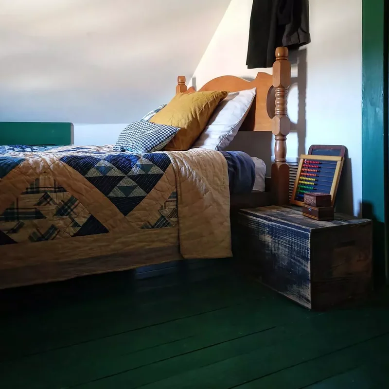 28 Sloped Ceiling Bedroom Ideas That Maximize Your Space 18 Rustic Touches