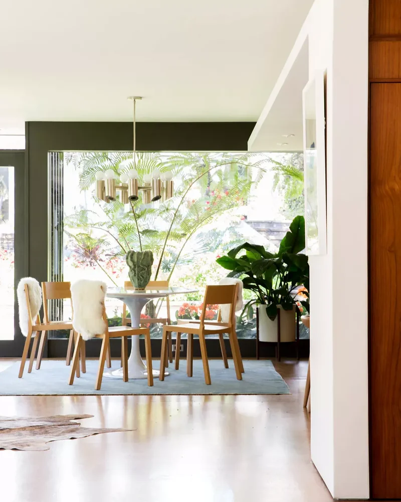 43 Stunning Dining Table Centerpiece Ideas for Every Season 38 Sculptural Empty Vase