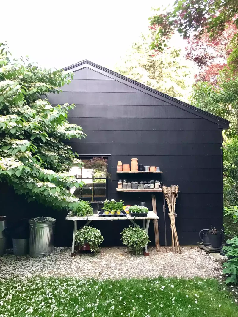 27 Small Backyard Ideas to Help You Make the Most of Space 9 Set Up a DIY Potting Bench