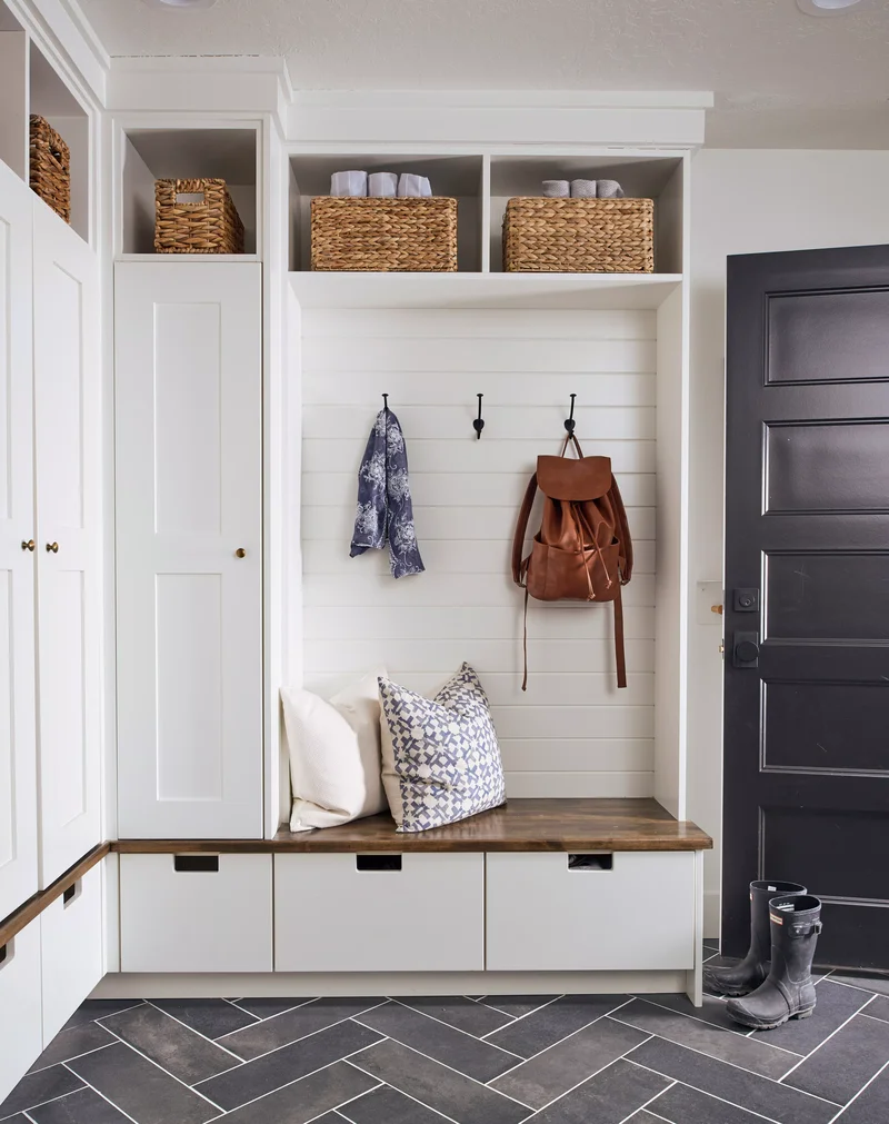 31 Compact Mudroom Ideas to Boost Style and Functionality 15 Small Mudroom with Dark Floor Tile