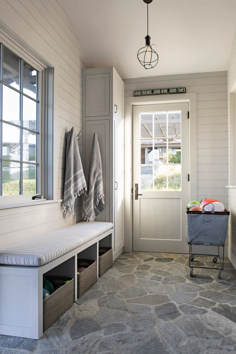 31 Compact Mudroom Ideas to Boost Style and Functionality 14 Small Mudroom with Stone Flooring
