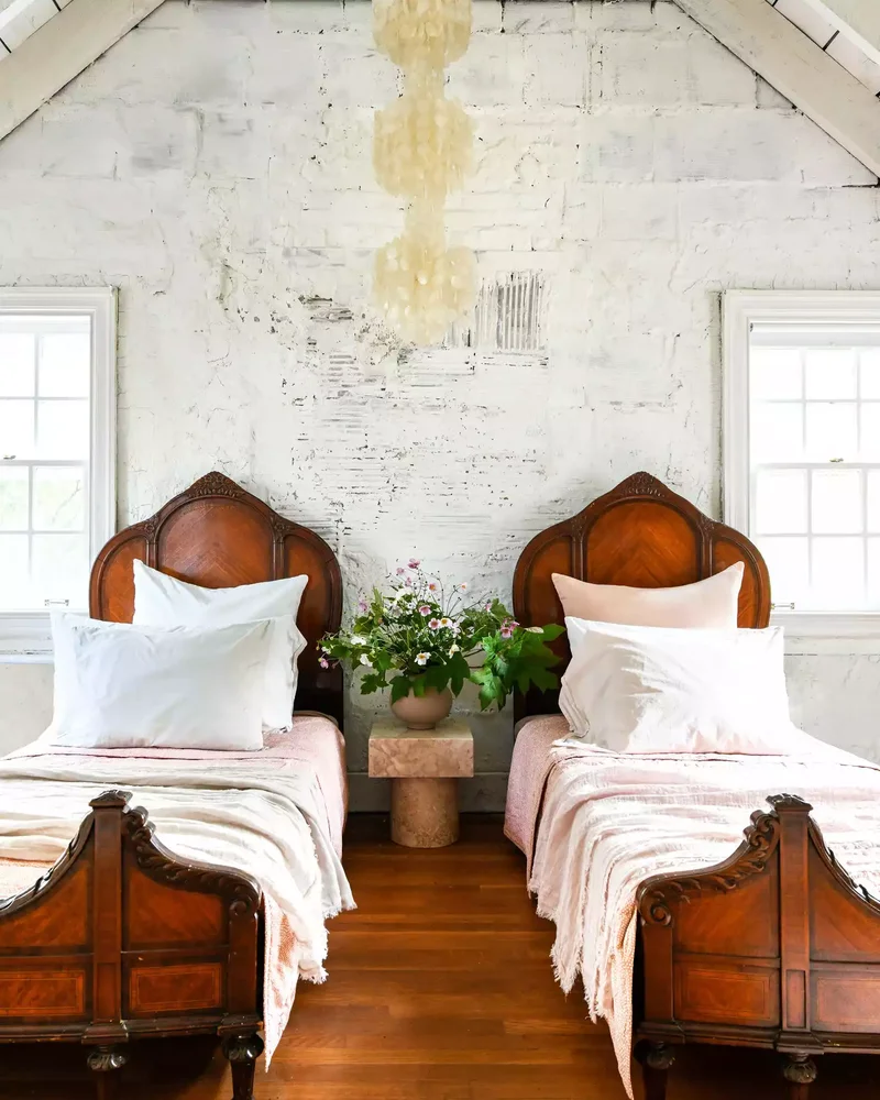37 Guest Bedroom Ideas to Make Visitors Feel at Home 35 Source Twin Antique Beds