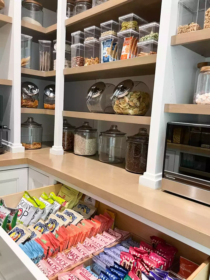 37 Corner Pantry Solutions That Boost Space and Design 10 Stacked Plastic Bins