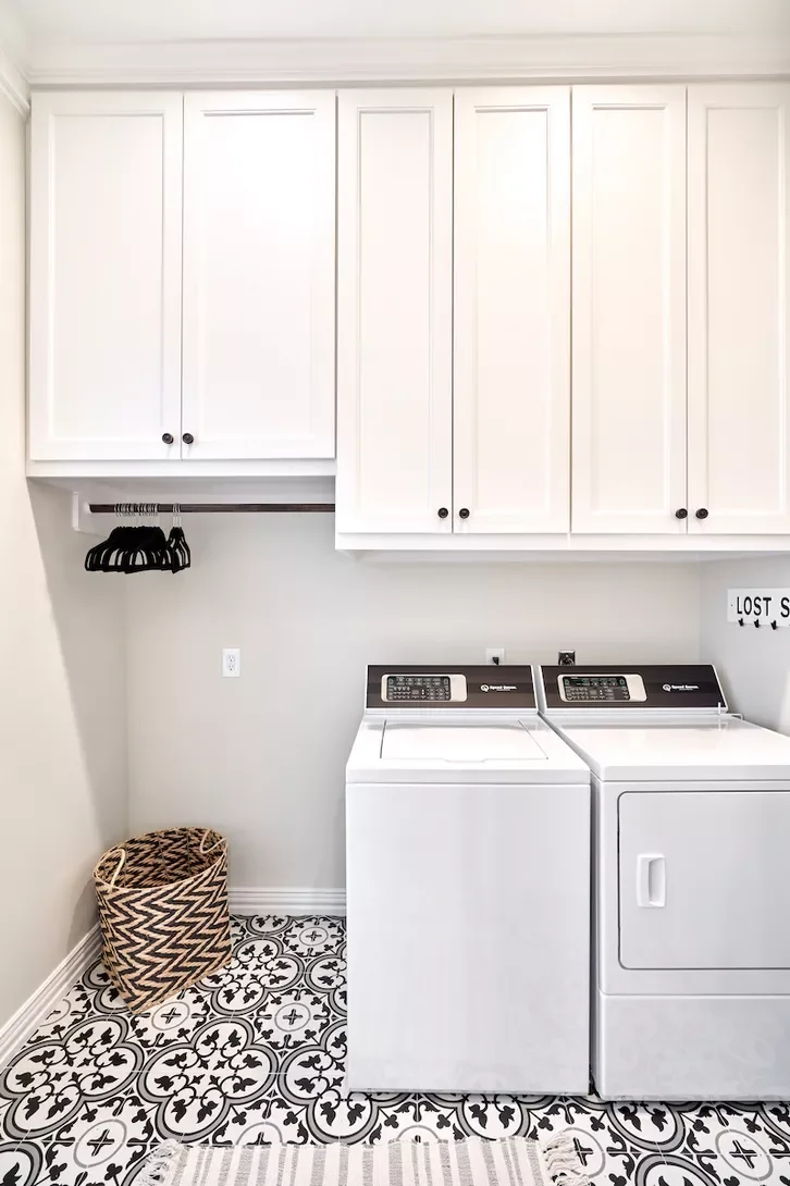 57 Laundry Room Ideas That Make Chores More Enjoyable 43 Stick to Black and White