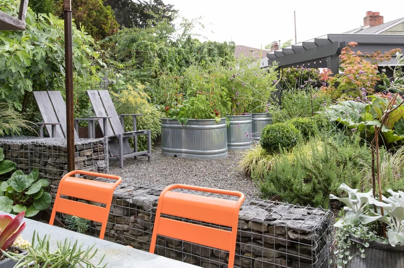 25 Beautiful Raised Garden Bed Ideas for Veggies & Flowers 24 Stock Tank Raised Beds