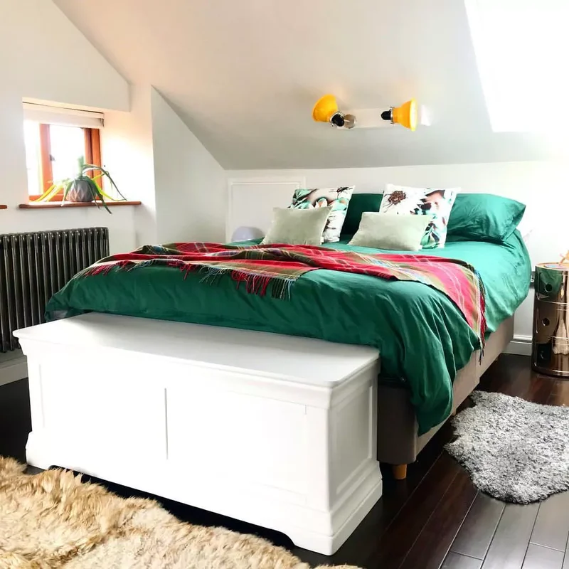 28 Sloped Ceiling Bedroom Ideas That Maximize Your Space 14 Strategic Sconces