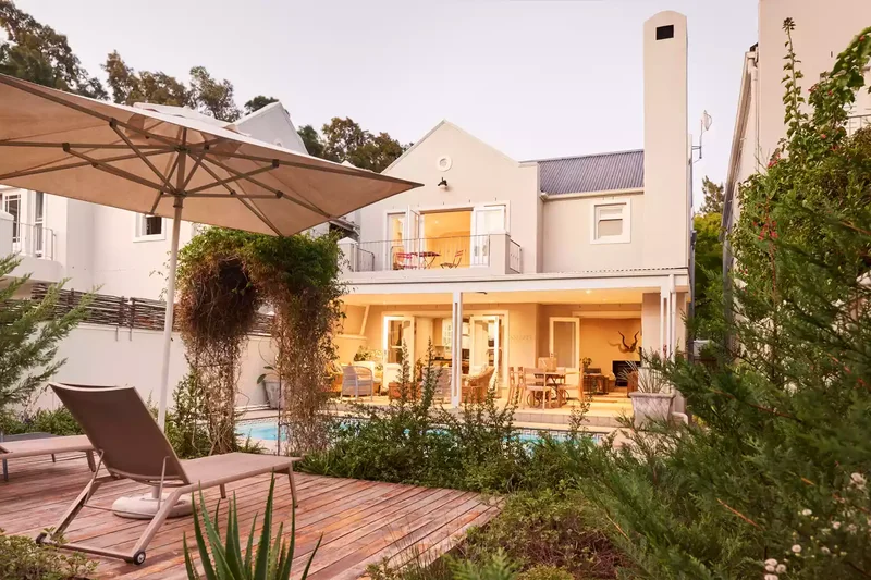 15 Beautiful Floating Deck Ideas for Any Outdoor Space 1 Surround It With Greenery