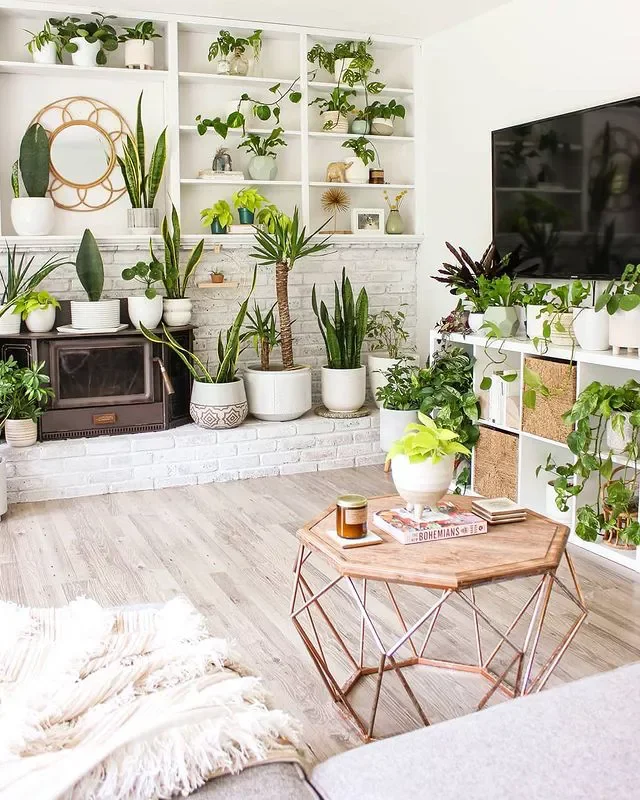 21 Electric Fireplace Ideas That'll Cozy Up Any Room 13 Surround It With Plants