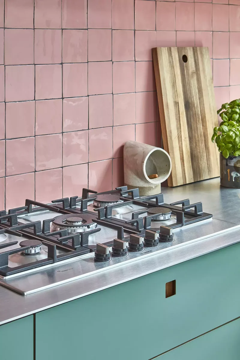 31 Kitchen Color Schemes for Every Style to Transform Your Space 5 Teal Cabinets + Pink Tiles