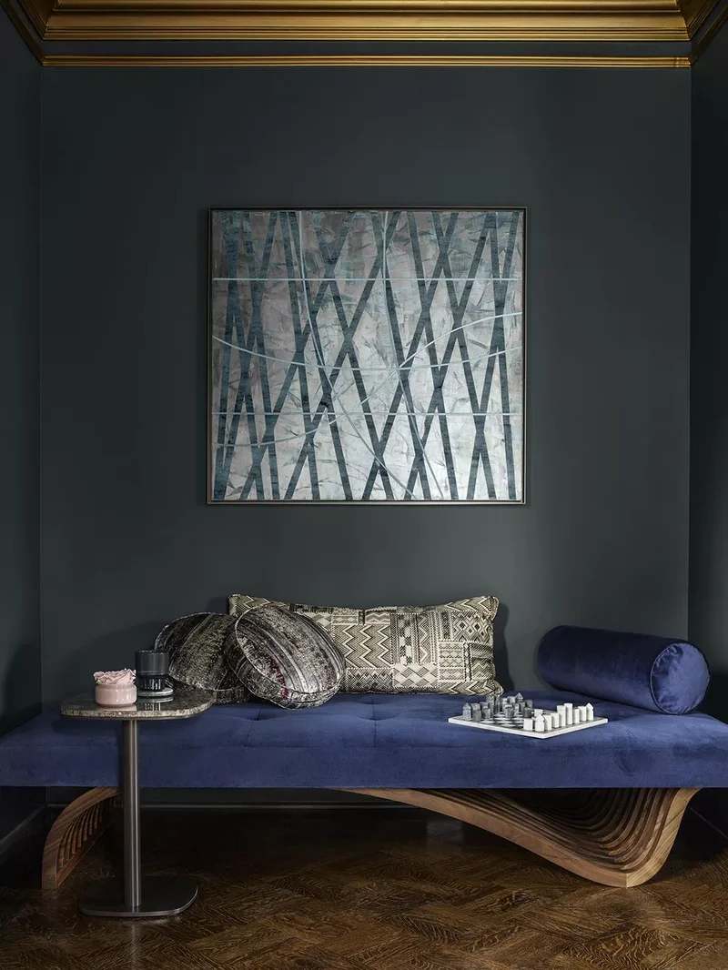 Teal Walls and Blue Sofa