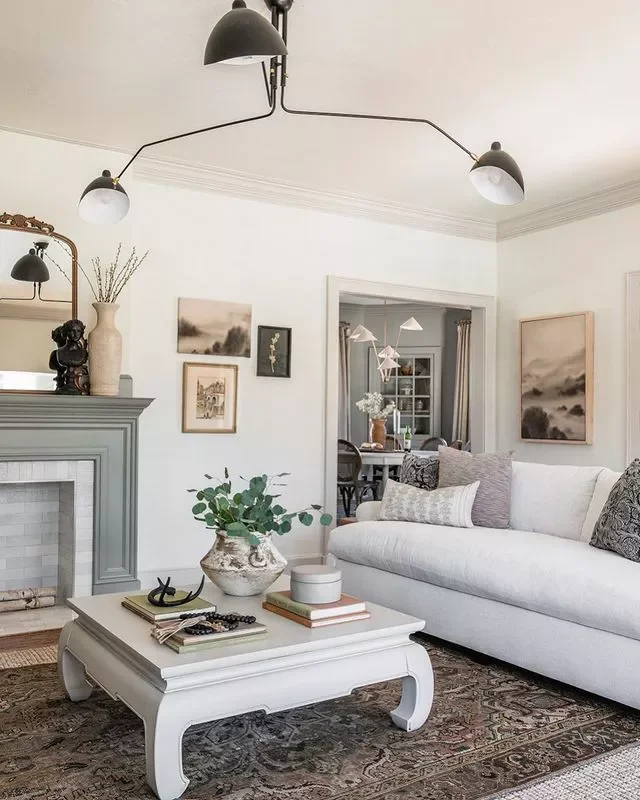 30 Living Room Wall Decor Ideas to Make a Bold Statement 2 Think in Threes