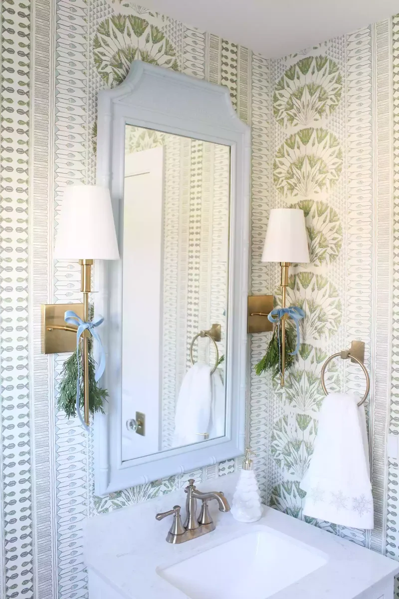 Decorating Your Bathroom for Christmas: 32 Festive Ideas 5 Tie Sconces With Ribbons