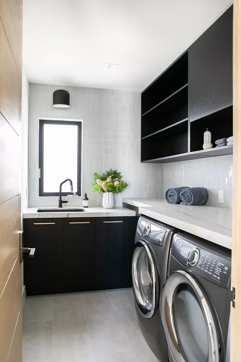 53 Stylish Small Laundry Room Ideas That Work Beautifully 15 Tile a Full-Wall Backsplash