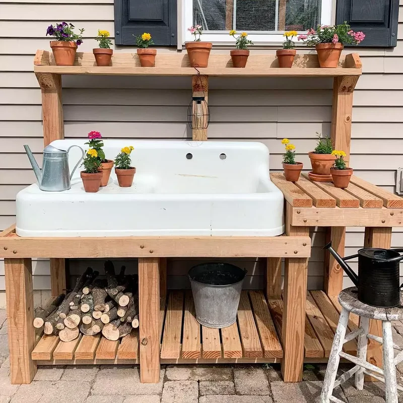 12 Outdoor Sink Ideas That Will Transform Your Backyard 12 Try This Outdoor Sink and Potting Bench Combo