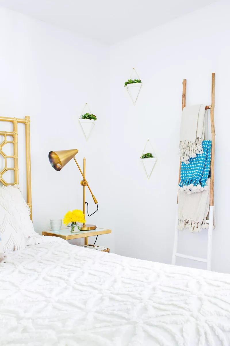 22 Guest Bedroom Ideas to Make the Most of Small Spaces 12 Try a Blanket Ladder