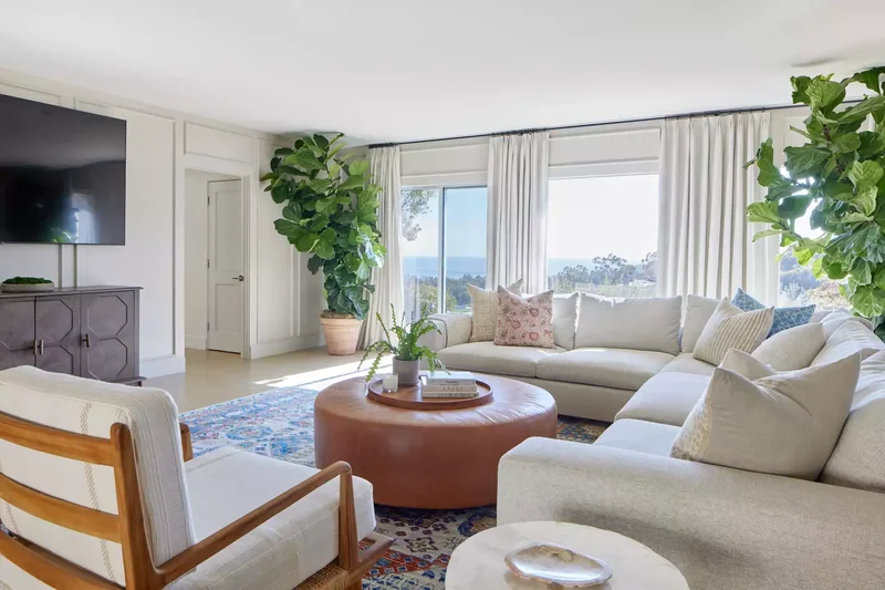 50 Formal Living Room Ideas That Feel Fresh and Inviting 30 Try a Coffee Table Ottoman