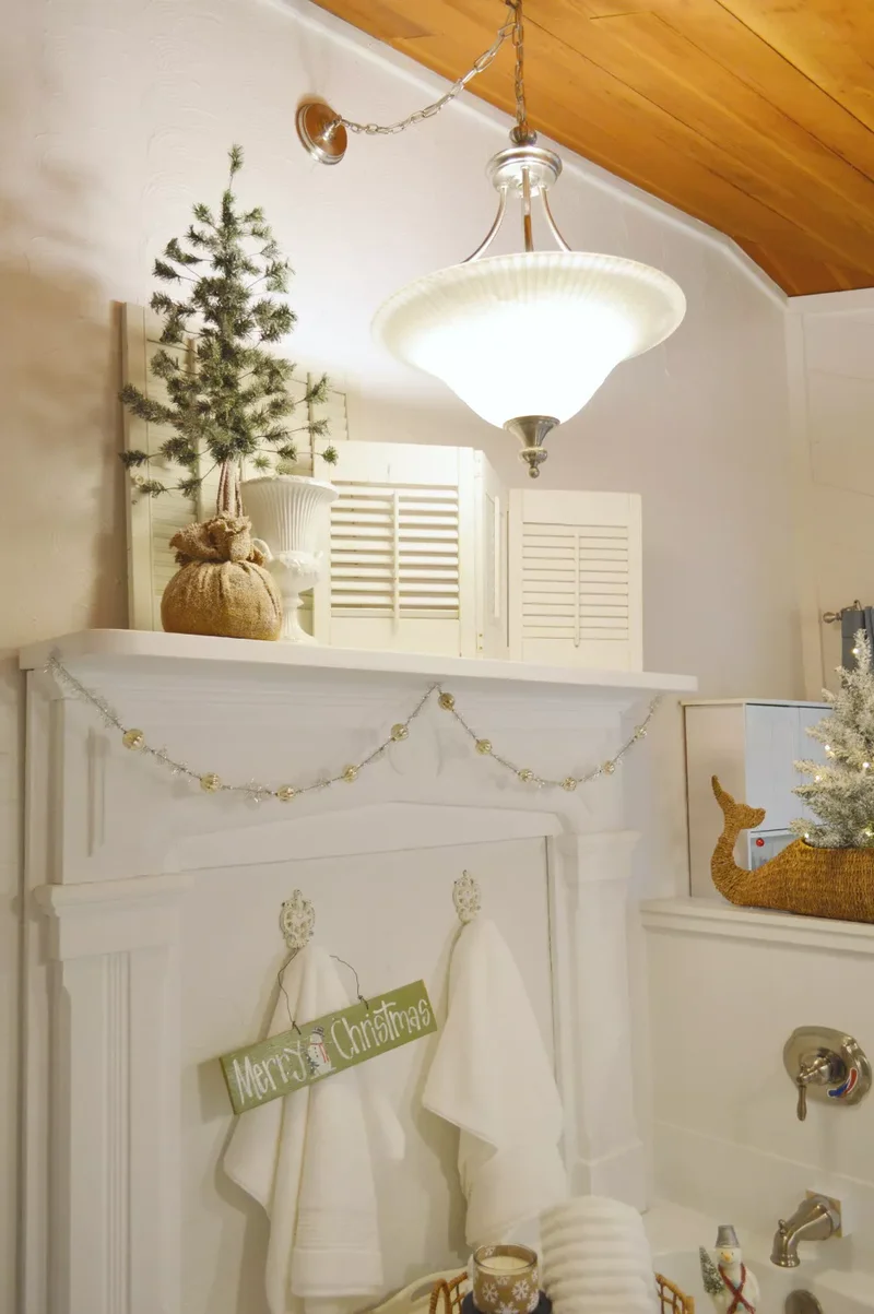 Decorating Your Bathroom for Christmas: 32 Festive Ideas 22 Try a Mercury Glass Garland