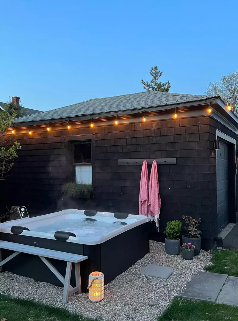 27 Small Backyard Ideas to Help You Make the Most of Space 6 Try a Portable Hot Tub
