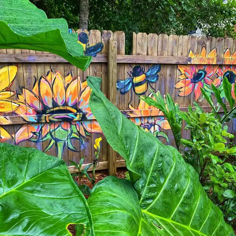 30 Creative Fence Decorating Ideas to Transform Your Yard 1 Upcycle Paint Directly on the Fence