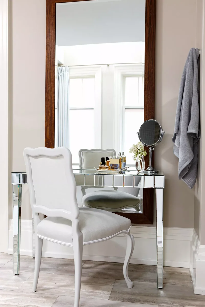 17 Makeup Vanity Ideas for Your Bathroom's Daily Routine 9 Use Furniture as a Bathroom Makeup Vanity