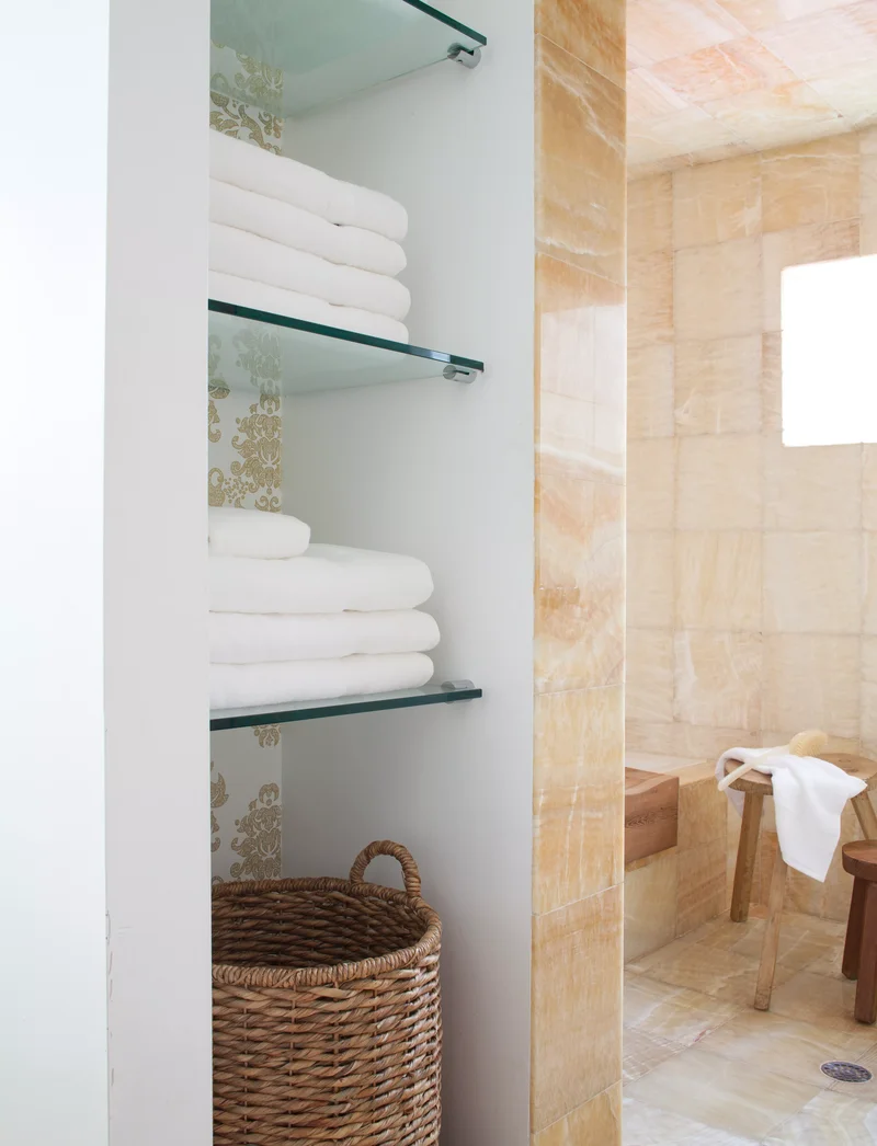 26 Smart Bathroom Shelf Ideas for Organized Toiletries 17 Use Glass Shelves for an Open Look