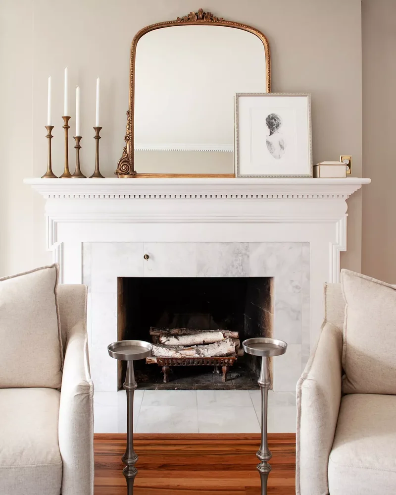 57 Fireplace Styling Ideas to Transform Your Living Space 12 Use Warm Metal Tones