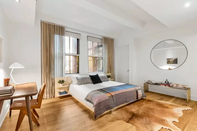 35 Apartment Bedroom Ideas to Add Personality and Warmth 15 Use a Low Bed Frame Near a Window