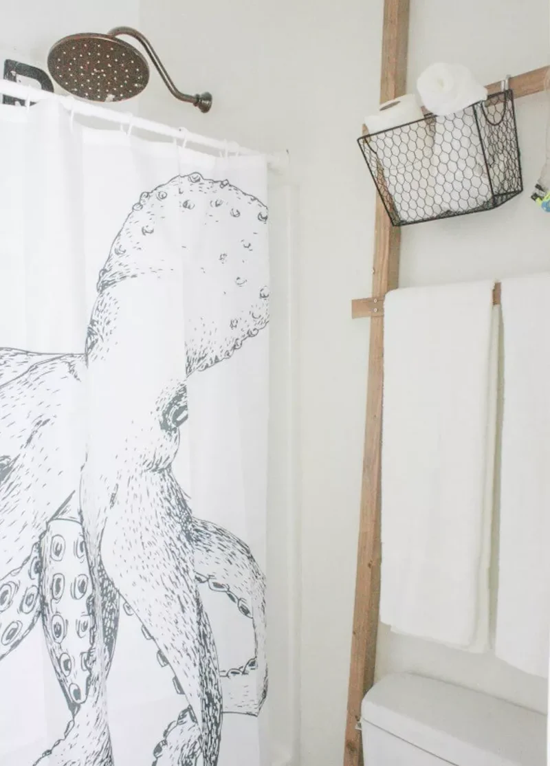 43 Bathroom Storage Solutions for More Space and Style 32 Use a Storage Ladder for Towels