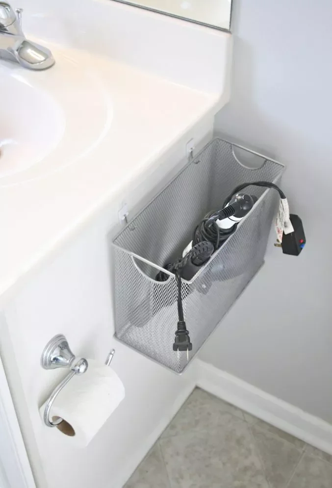 43 Bathroom Storage Solutions for More Space and Style 35 Use a Wire Basket for Hot Tools