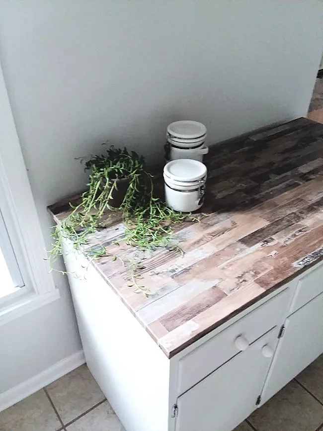 25 Creative DIY Countertop Projects to Transform Your Kitchen 19 Wallpaper Covered Countertops