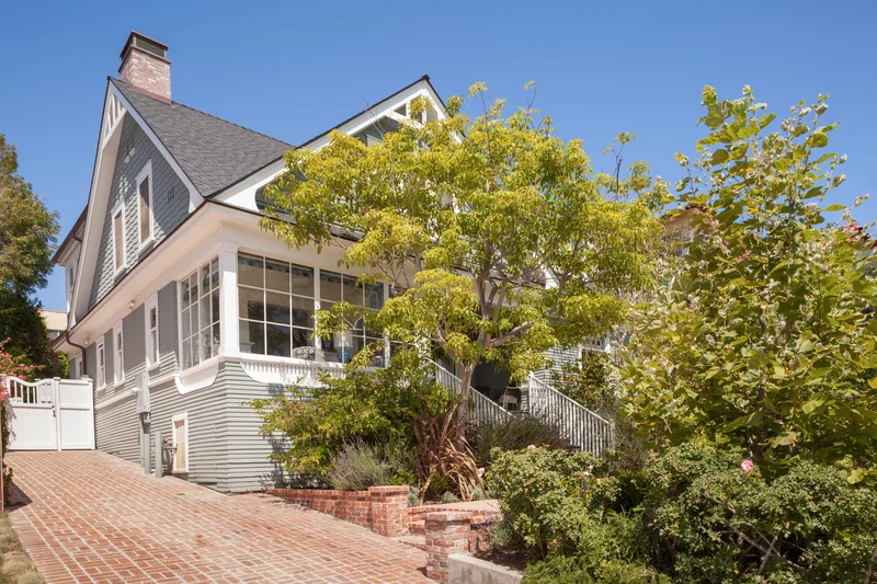 15 Stunning Driveway Designs That Boost Your Home's Appeal 7 Warm Up the Front Entry