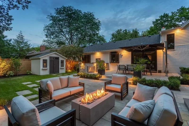 39 Contemporary Backyard Ideas to Elevate Your Outdoor Oasis 10 Warm With a Fire Table