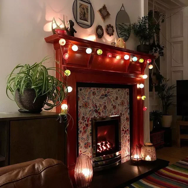 36 Beautiful Painted Fireplace Ideas for Your Home 26 Weave Lights Around a Painted Fireplace