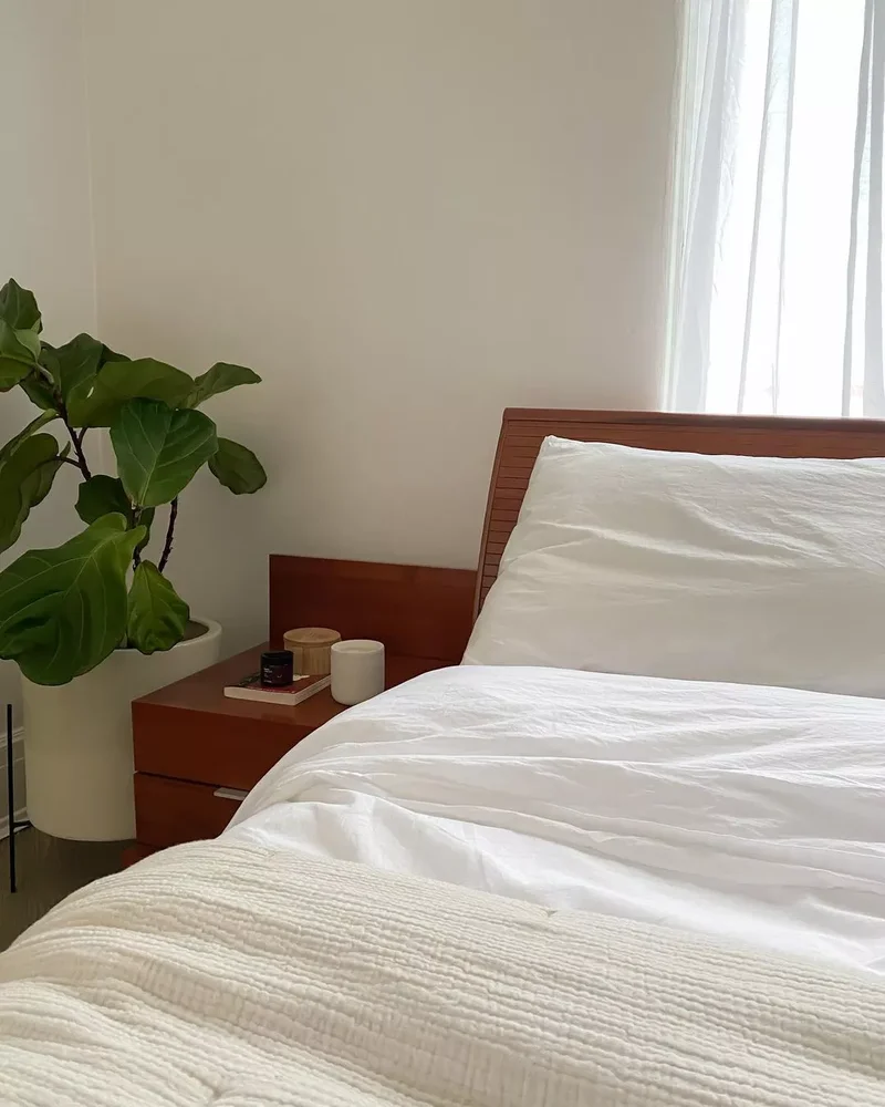 40 White Bedroom Designs That Show This Color Is Far from Dull 26 White Bedroom With Organized Nightstand