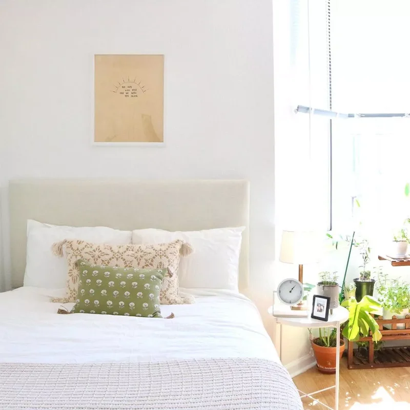 40 White Bedroom Designs That Show This Color Is Far from Dull 7 White Bedroom With Poppy Pillows