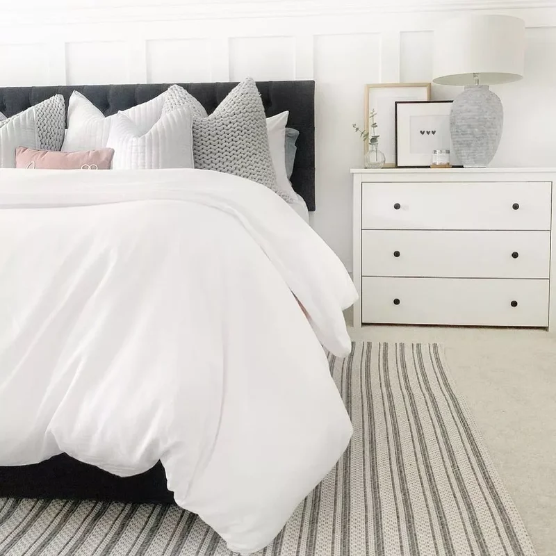 40 White Bedroom Designs That Show This Color Is Far from Dull 11 White Bedroom With Striped Rug