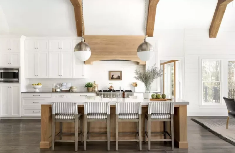 34 White & Wood Kitchen Designs That Feel Fresh and Timeless 15 White Cabinets With a Wood Vent Hood and Beams