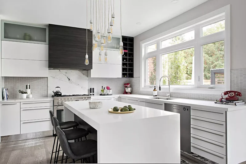 White Kitchen With Waterfall Island