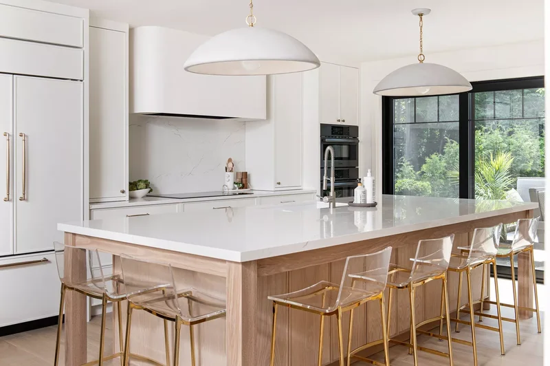 White and Gold Kitchen With Curved Elements