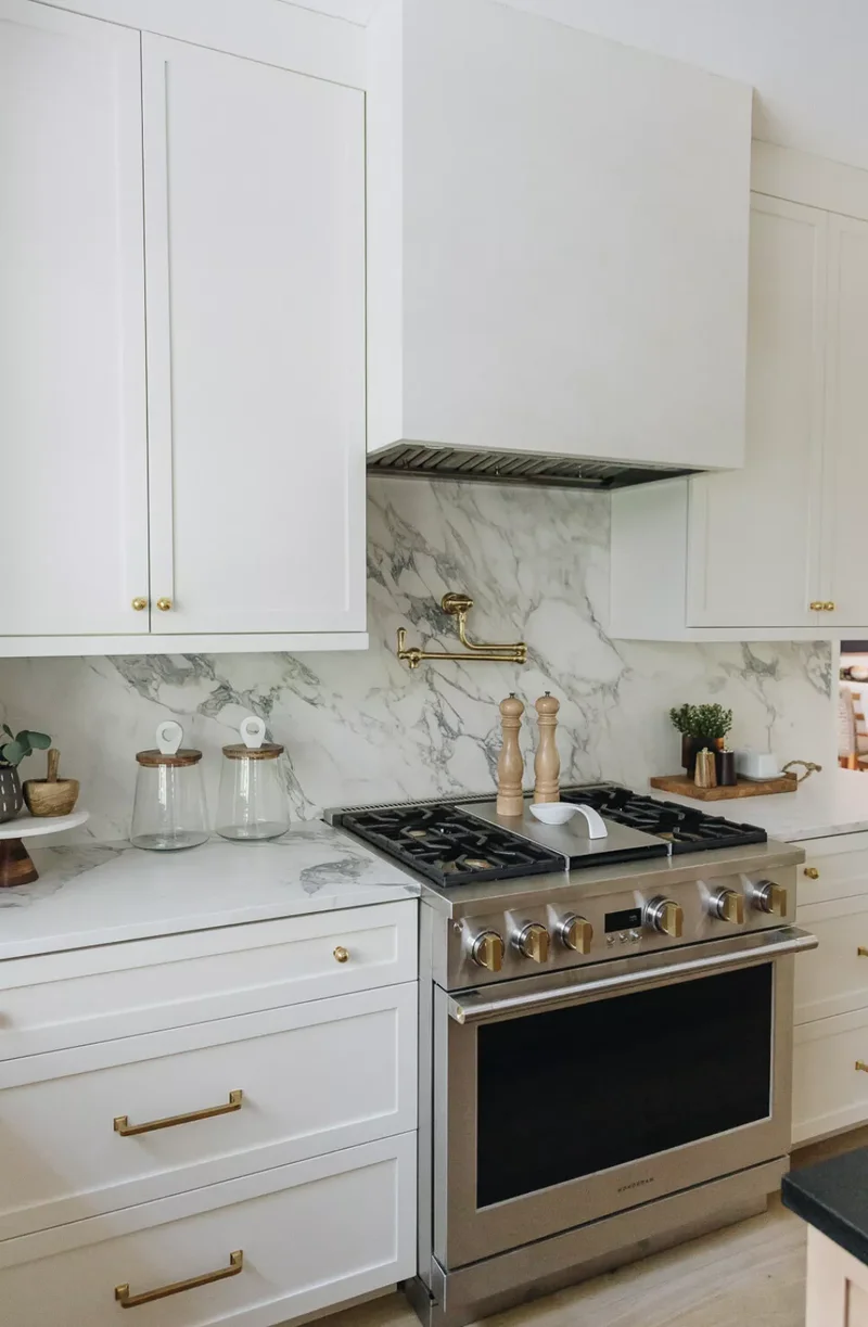 White and Gold Kitchen With Marble