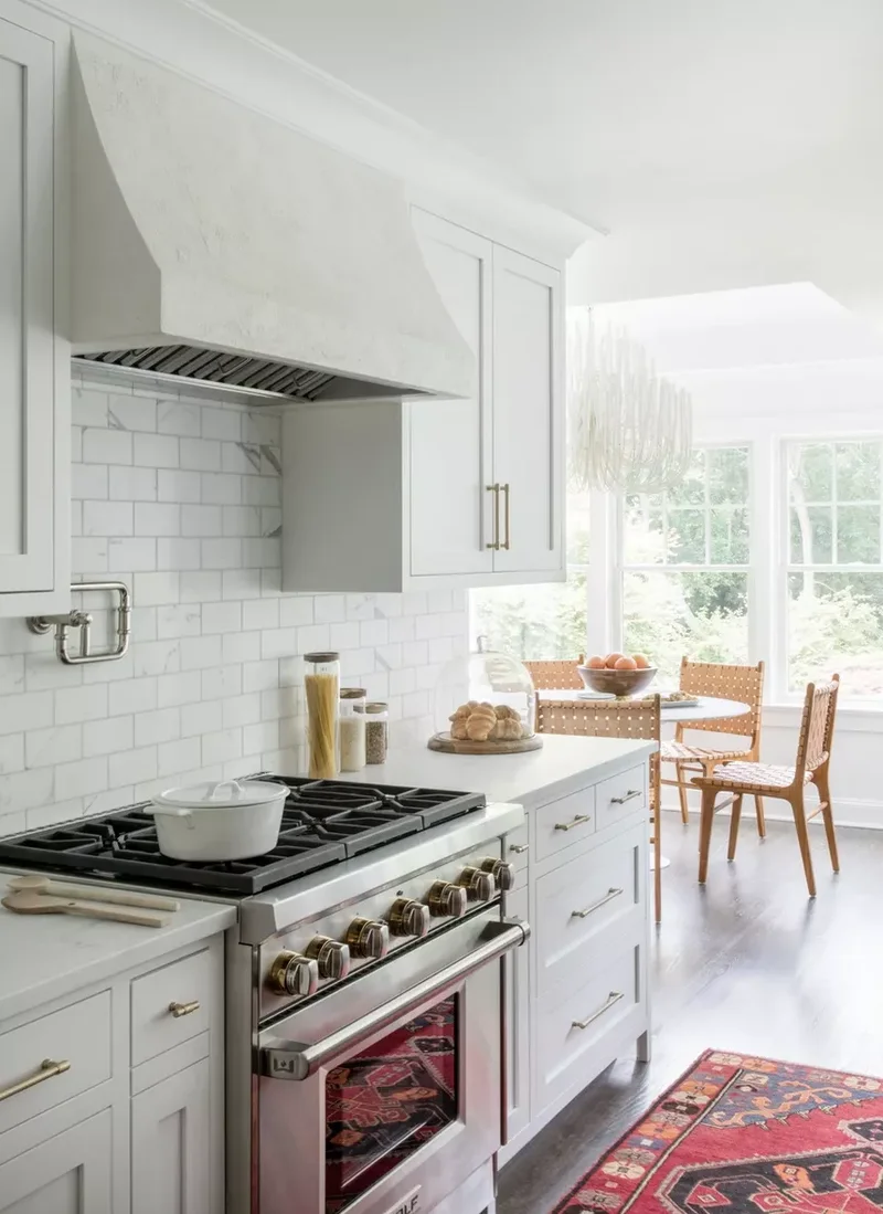 White and Gold Kitchen With Subway Tile