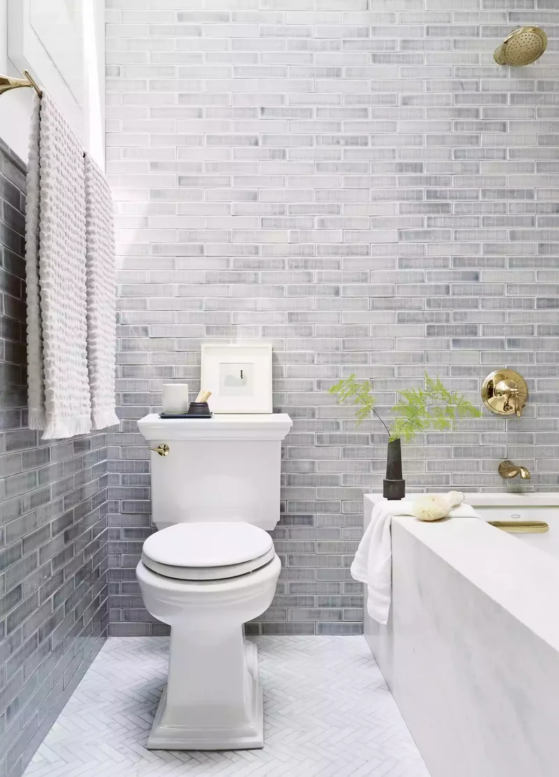 30 Neutral Bathroom Designs That Feel Timeless & Serene 13 Whitewashed Brick Neutral Bathroom