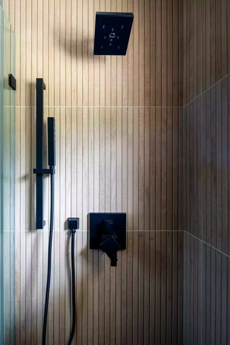 30 Designer Tips for Creating a Japandi Bathroom Retreat 26 Wood-Look Shower Tiles