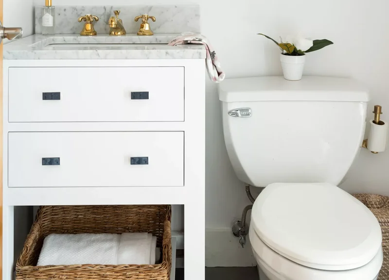 15 Creative Toilet Paper Storage Ideas for Your Bathroom 7 Woven Wonder